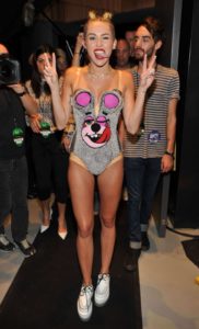 Miley Cyrus half naked