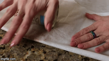 rolling dough with can of clams